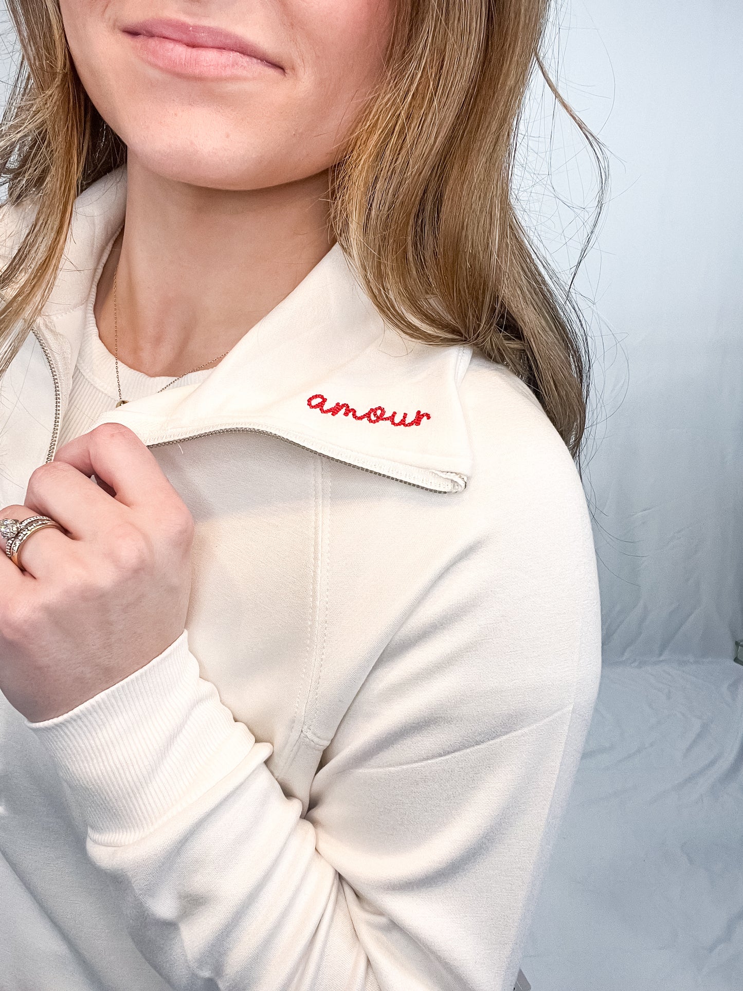 EMBROIDERED HALF ZIP